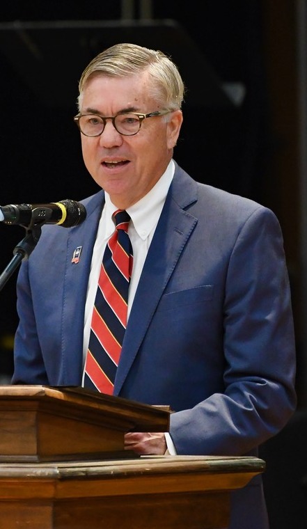 Jim Gulley speaking at a podium